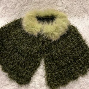 Gorgeous hand crocheted capelet with rabbit fur trim. Ties at neck. One size.